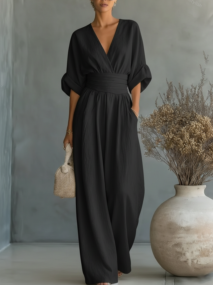 Elegante mono con escote en V, cintura alta y pierna ancha