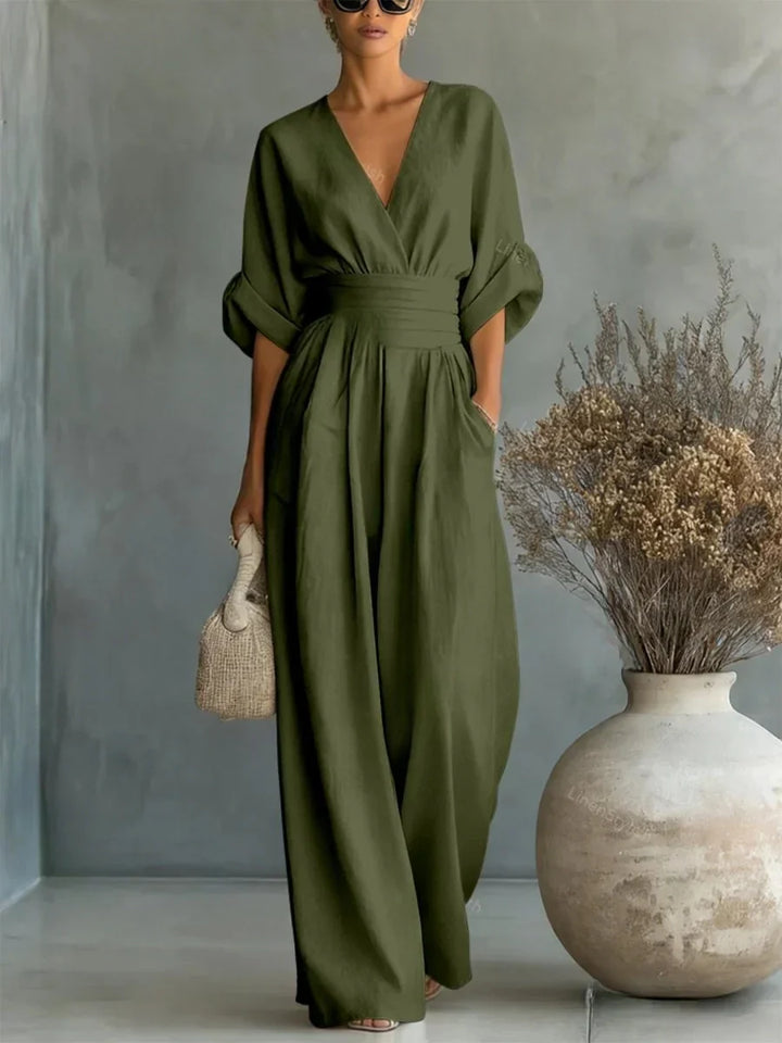 Elegante mono con escote en V, cintura alta y pierna ancha